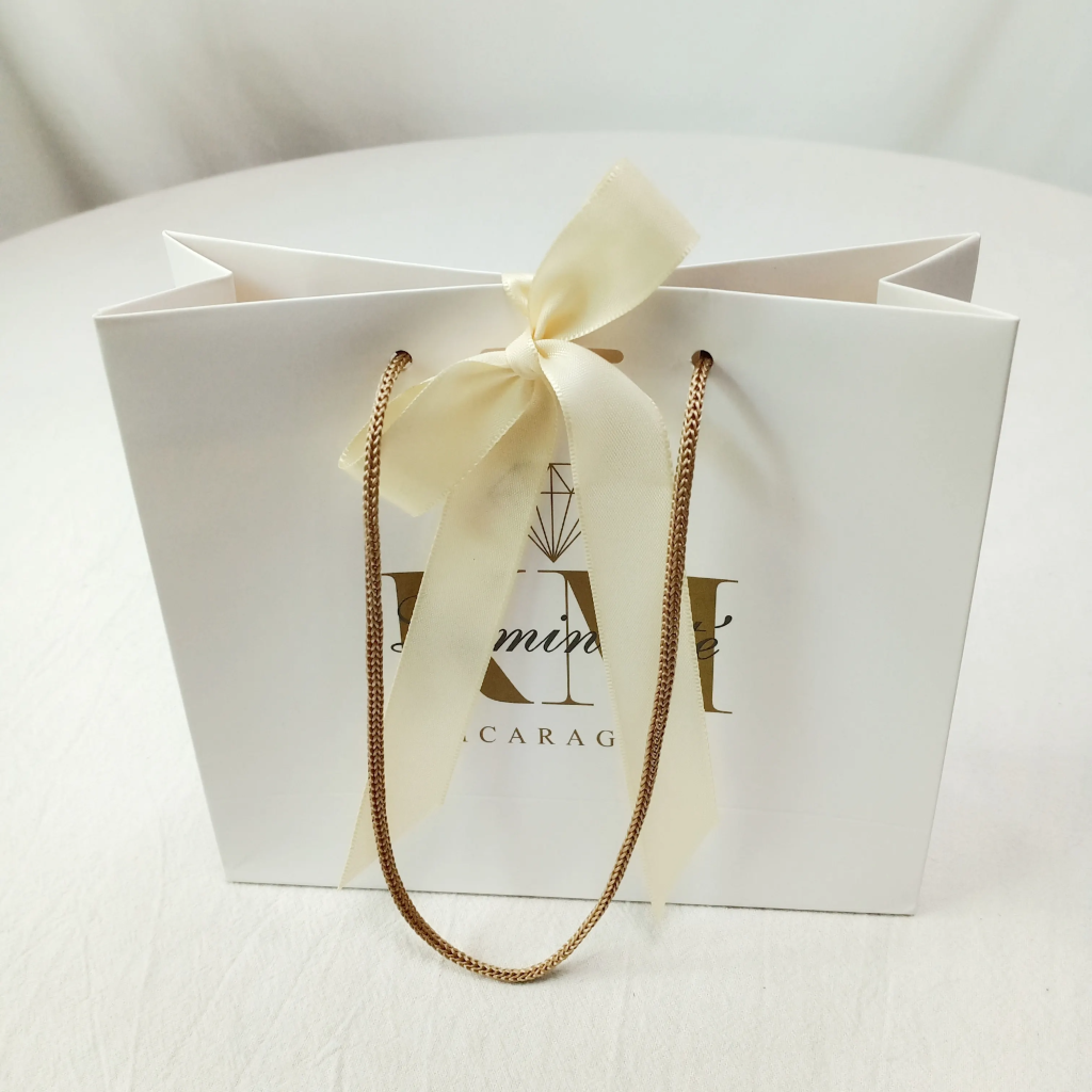 White custom paper bags with rope and ribbon handles